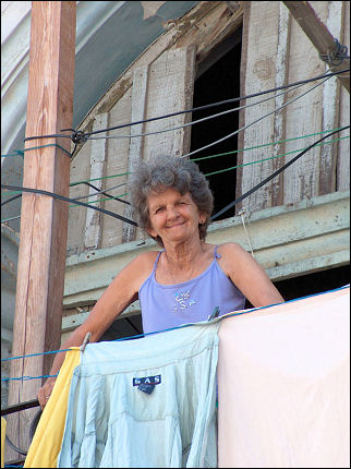 Cuba - Havana, woman on balcony