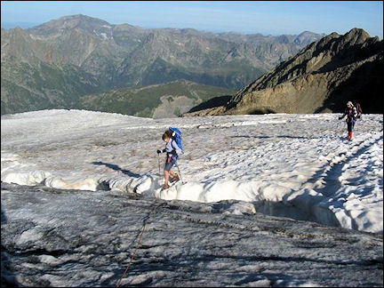 France, Haute-Savoie, Rhône-Alpes - Jumping over glacier fissures on Glacier du Tour