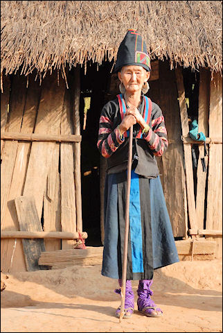 Laos - Mong woman with nice purple socks