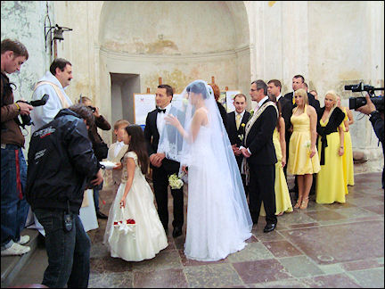 Lithuania, Vilnius - Bridal procession waiting for their turn