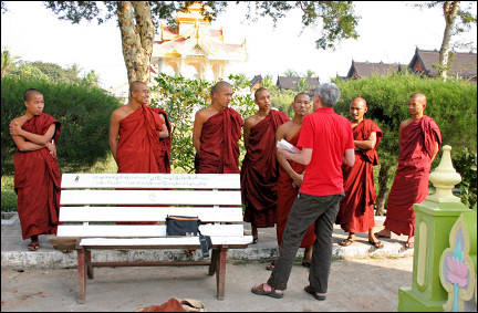 Myanmar, Mandalay - Aart talking with monks