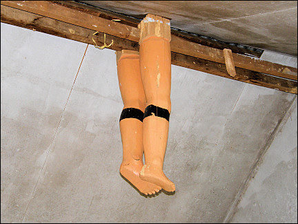 Malaysia, Borneo, Sabah - Wooden legs suspended from the ceiling in the Murut village