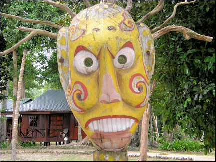 Malaysia, Borneo, Sabah - Wooden statue at the entrance of our resort on Pulau Tiga