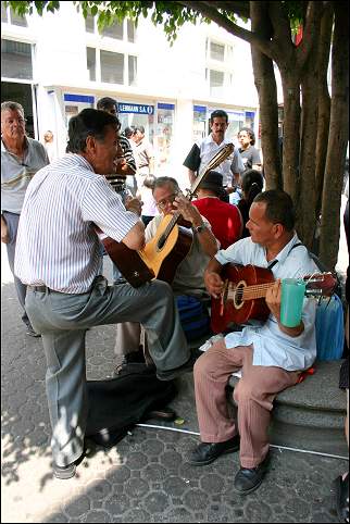 Panama - San José, playing guitar in the street