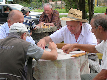 Romania, Alba Iulia - Elderly men on the square