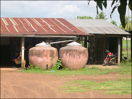 Thailand - Houses with earthenware rain barrels