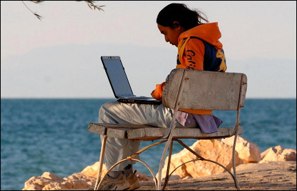 Turkey - Egirdir, girl with lap top computer