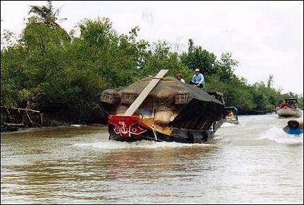 Vietnam - My Tho, rice boat