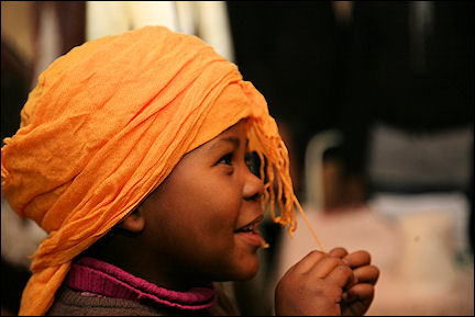 South Africa, Cape Town, Langa - Vicky's nephew prays
